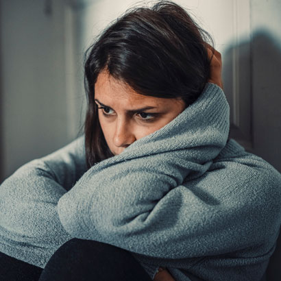 woman-with-grey-sweater-looking-sad